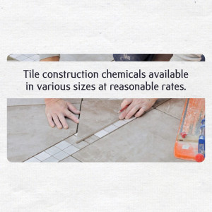Close-up of hands applying tile adhesive with tools and tiles.