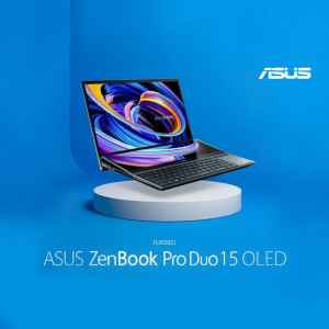 ASUS Zenbook Pro 15 OLED laptop on a pedestal with a vibrant screen display.