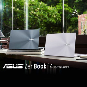 Two ASUS ZenBook 14 laptops, one dark blue and one white, displayed on a wooden surface.
