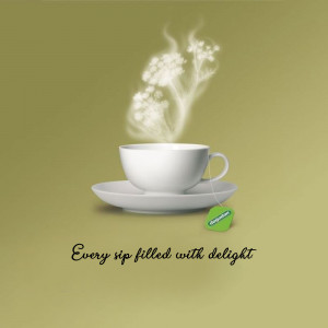 A white teacup with steam forming the shape of flowers and a Chapman tea bag attached.