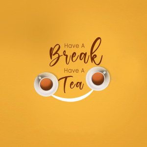 Two cups of tea arranged to look like a smiling face with the text 'Have a Break' and 'Have a Tea'