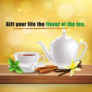 A white teapot and cup of tea with cinnamon sticks, vanilla bean, and mint leaves on a wooden surface.