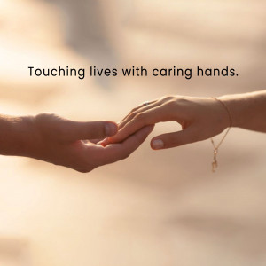 Two hands reaching out and touching, symbolizing care and support.