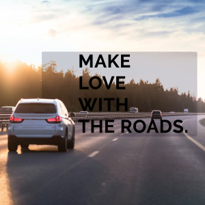 Rear view of a white SUV driving on a highway with text overlay 'Make Love With The Roads'.