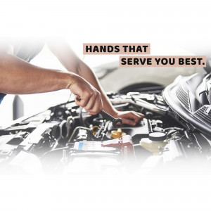 Mechanic working on a car engine with text overlay 'Hands that serve you best.'