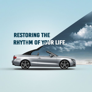 Silver Audi convertible with a dramatic sky background and text 'Restoring the Rhythm of Your Life.'