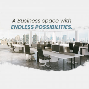 Open plan office with desks and a cityscape view