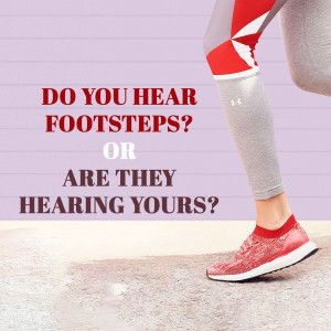 Close-up of a runner's legs with motivational text overlay