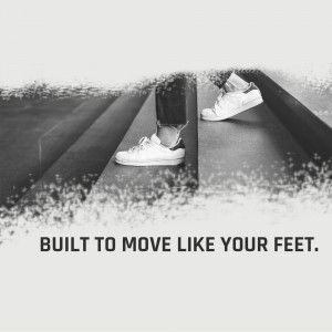 Close-up of feet wearing white Adidas sneakers on a textured surface with text overlay.