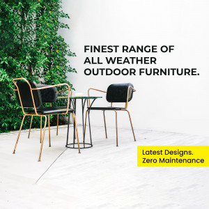 Black and gold outdoor furniture set against a white wall with green foliage