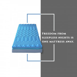 Blue mattress on a split white and gray background with text promoting better sleep.