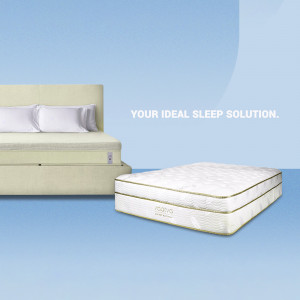 Image of Nodby mattresses with pillows against a blue background.