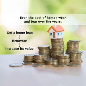 Stack of coins with a miniature house on top, representing home investment and renovation.
