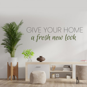 Minimalist living room with a plant and text 'Give Your Home a Fresh New Look'