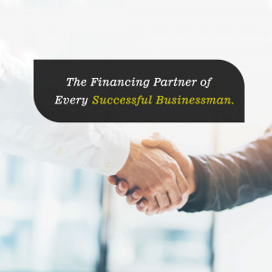 Handshake symbolizing a successful business partnership and financial support.