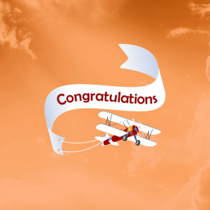 A biplane pulling a banner that says 'Congratulations' in a cloudy orange sky.