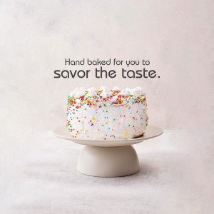 A small white cake with colorful sprinkles on a white cake stand.