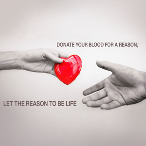 Two hands reaching towards each other with a red heart in between, promoting blood donation.