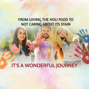 Three friends covered in colorful Holi powder smiling at the camera.