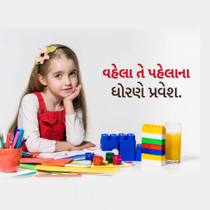A young girl sitting at a table with art supplies and building blocks.