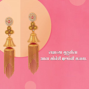 Close-up of ornate gold jhumka earrings with intricate detailing