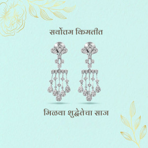 Close-up of sparkling diamond chandelier earrings on a light blue background with gold floral accents.