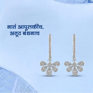 Close-up of sparkling diamond floral earrings on a light blue background with Marathi text.