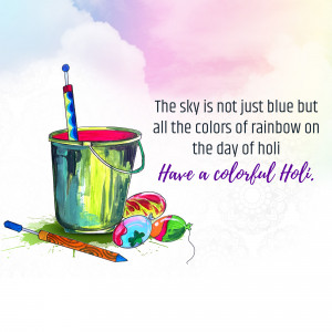 Holi celebration with paint bucket and water balloons