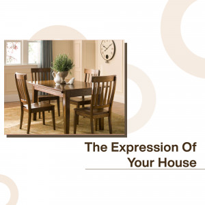 A warm and inviting dining room featuring a wooden dining table and chairs.