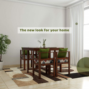 A well-lit dining room with a wooden table and green chairs.