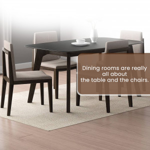 A modern dining room set with a dark table and light-colored chairs on a beige rug.