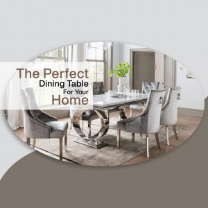 A luxurious dining table set with grey chairs and a marble-top table.