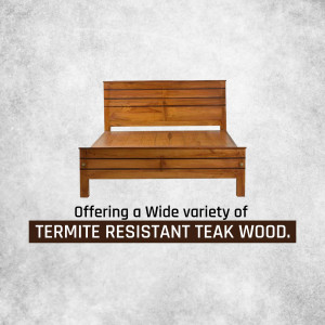 A wooden bed frame made of termite-resistant teak wood.