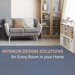 A cozy living room with a gray sofa, wooden cabinet, and rug.