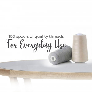 Close-up of spools of thread on a white surface with text 'For Everyday Use'