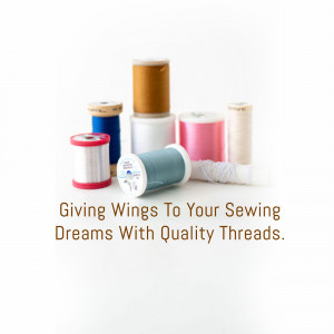 A collection of colorful spools of sewing thread.