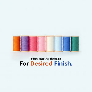 A row of colorful spools of sewing thread.