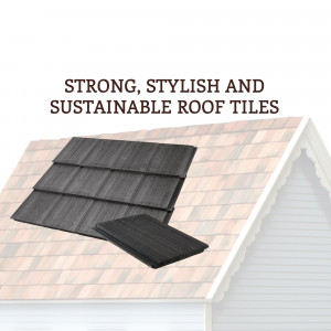 Close-up of dark grey roof tiles on a house roof