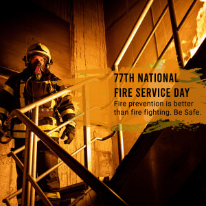 Firefighter ascending stairs with flames visible, promoting fire safety.
