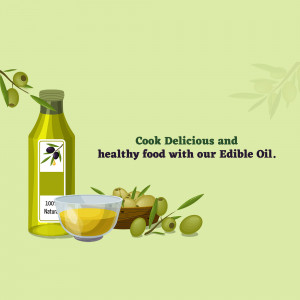 Bottle of olive oil with olives and a bowl of oil