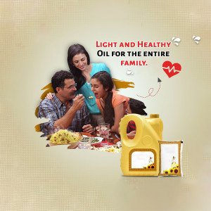 Family enjoying a meal together with a bottle of sunflower oil.