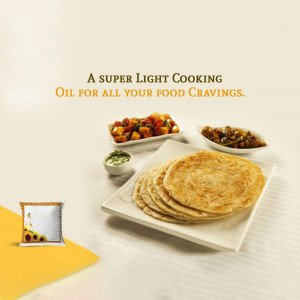 Image of Indian dishes like roti, sabzi, and chutney with a packet of cooking oil.