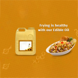 Edible oil container with a plate of fried food