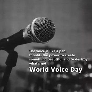 Close-up of a microphone with text celebrating World Voice Day