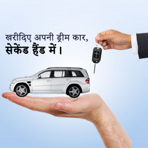 Hand holding car keys with a car on a palm