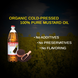 Bottle of organic cold-pressed mustard oil with mustard seeds