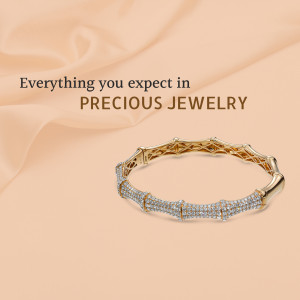 Gold and diamond bracelet on a peach silk background