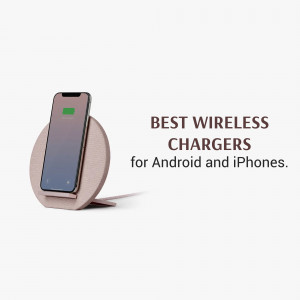 Pink wireless charger with a smartphone charging on it