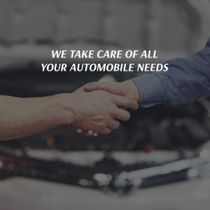 Handshake over a car engine, representing automotive care and trust.