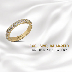 Close-up of a gold wedding band with diamonds